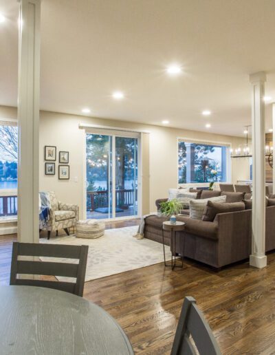 A living room with hardwood floors and a fireplace.